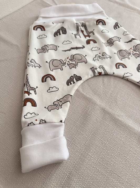 Saourel taille 6 mois à motif animaux fond blanc cassé